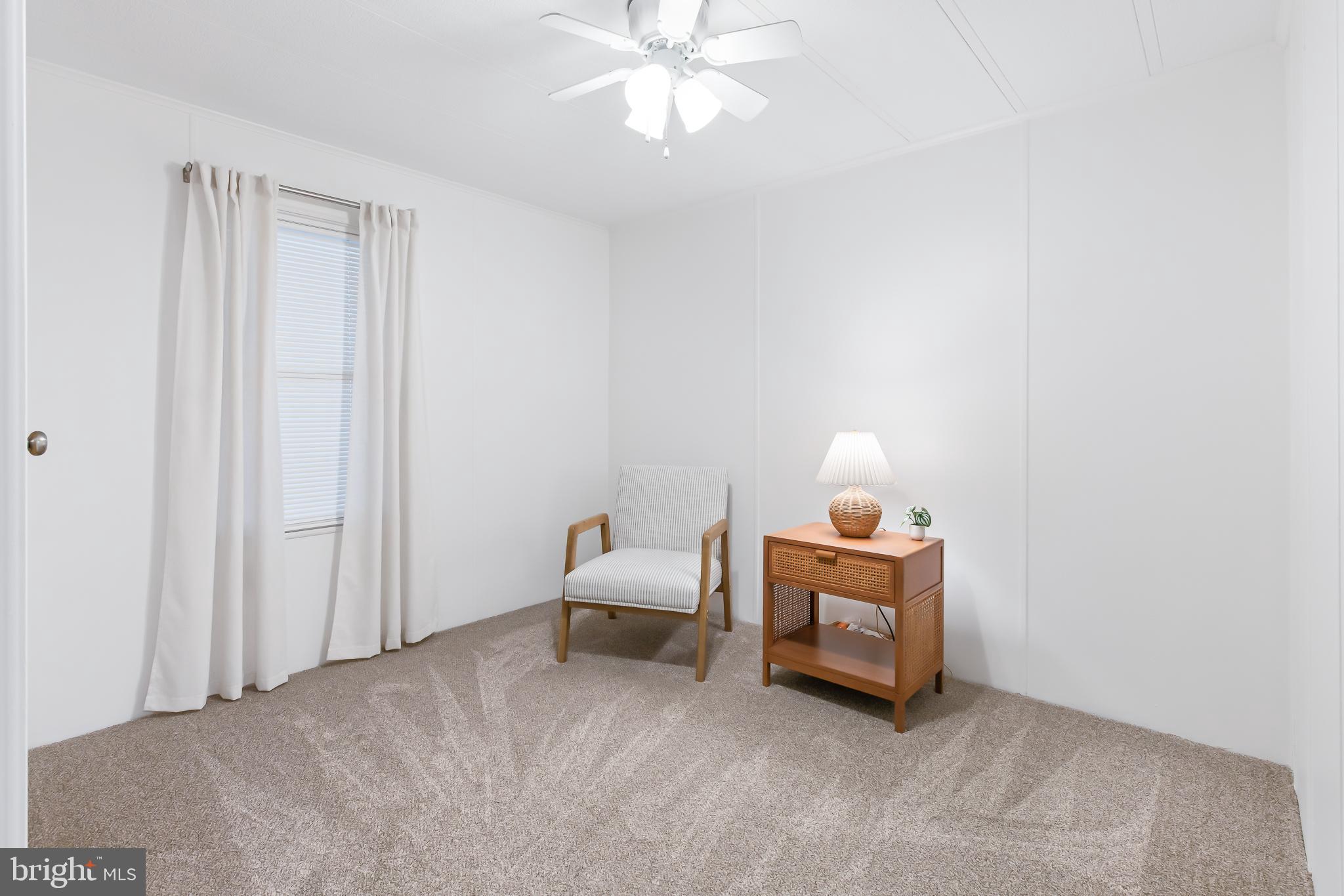 411 Maple Avenue Manheim, PA 17545 - Photo 24 of 35 a room with a bed and a chandelier