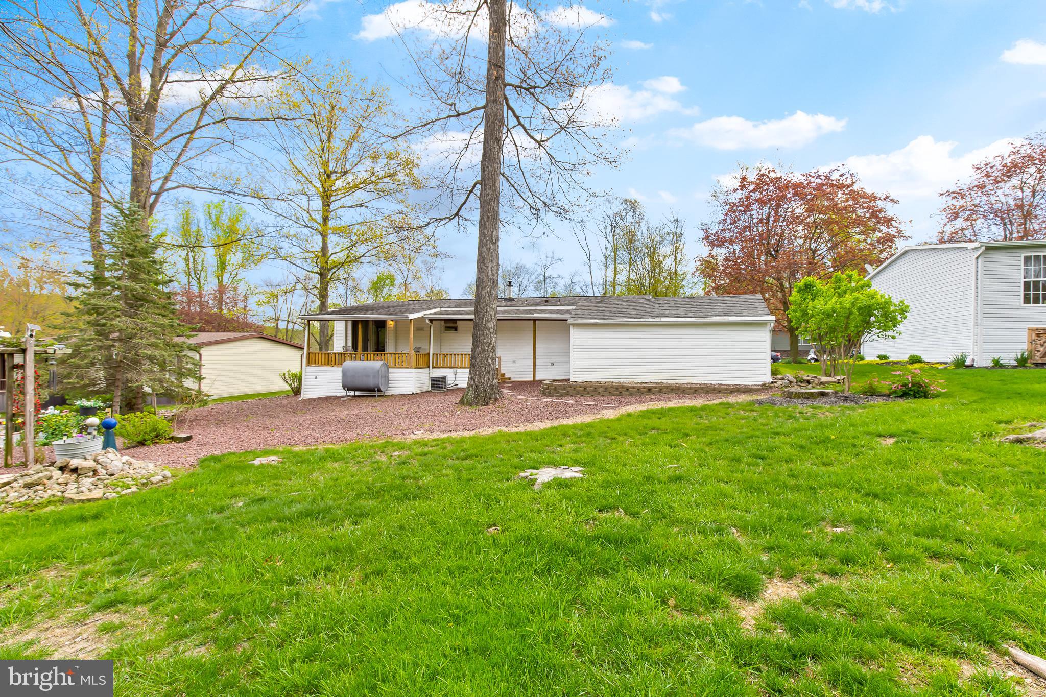 411 Maple Avenue Manheim, PA 17545 - Photo 30 of 35 a view of a house with a backyard