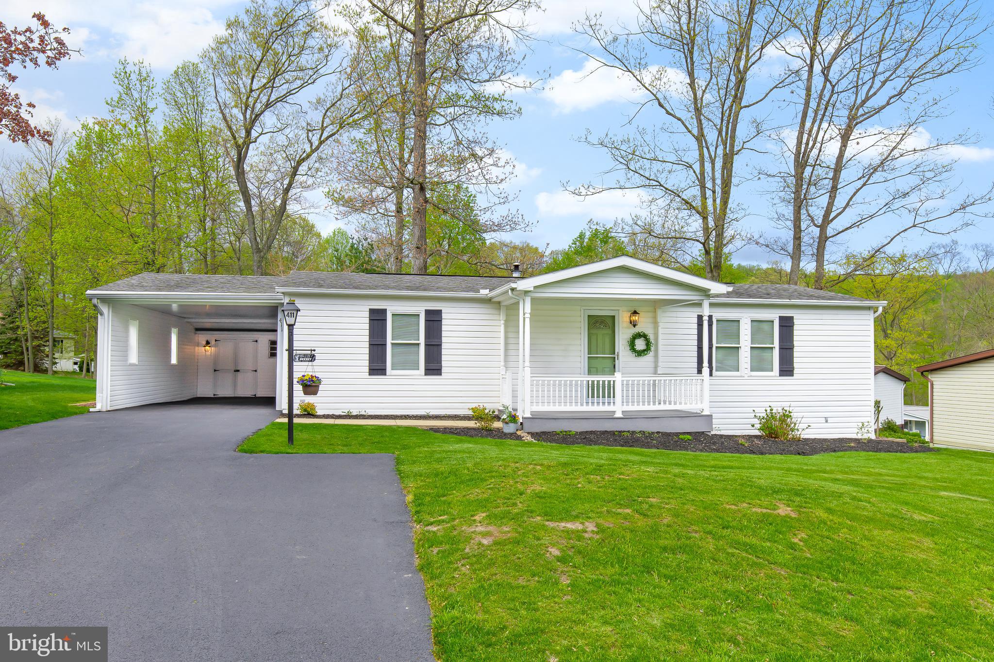 411 Maple Avenue Manheim, PA 17545 - Photo 34 of 35 a front view of house with yard and green space