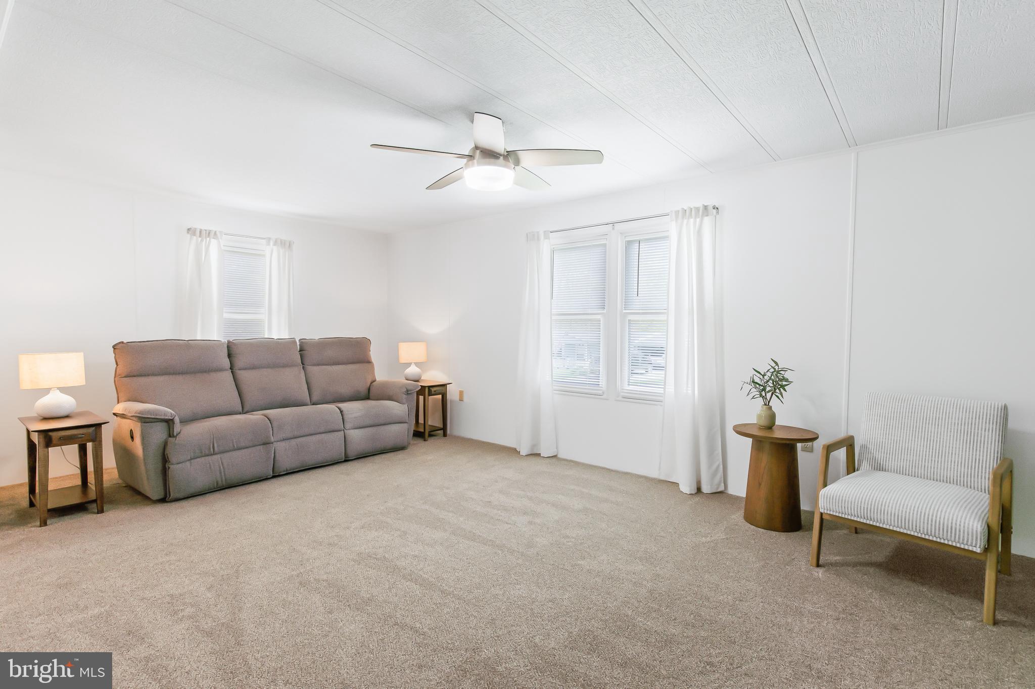 411 Maple Avenue Manheim, PA 17545 - Photo 6 of 35 a living room with furniture and a window