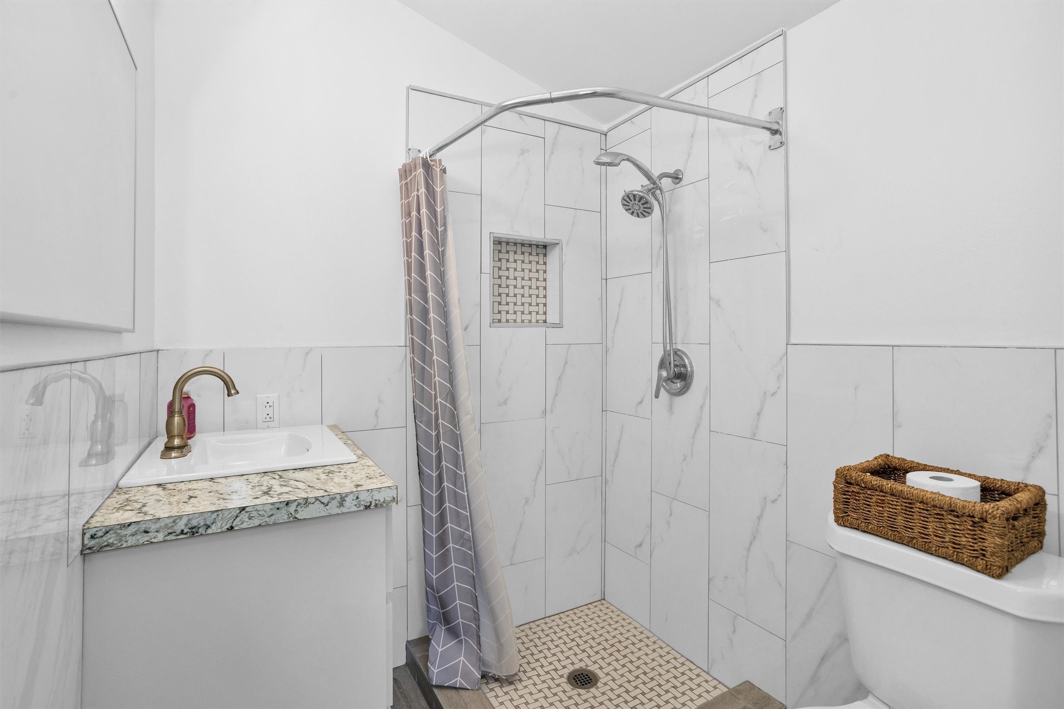 1102 Mosher Lane Houston, TX 77088 - Photo 38 of 50 a bathroom with a sink a toilet and shower