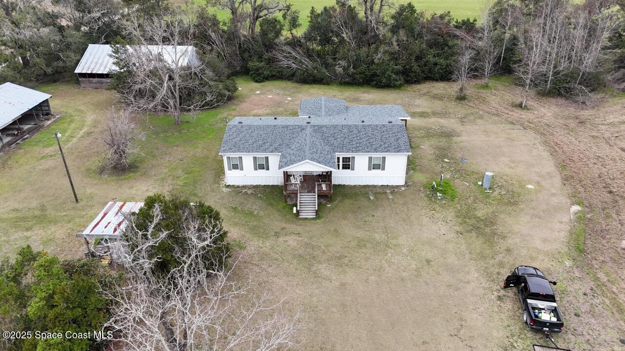 17189 County Road 252 Live Oak, FL 32060 - Photo 3 of 31 a view of a house with a yard