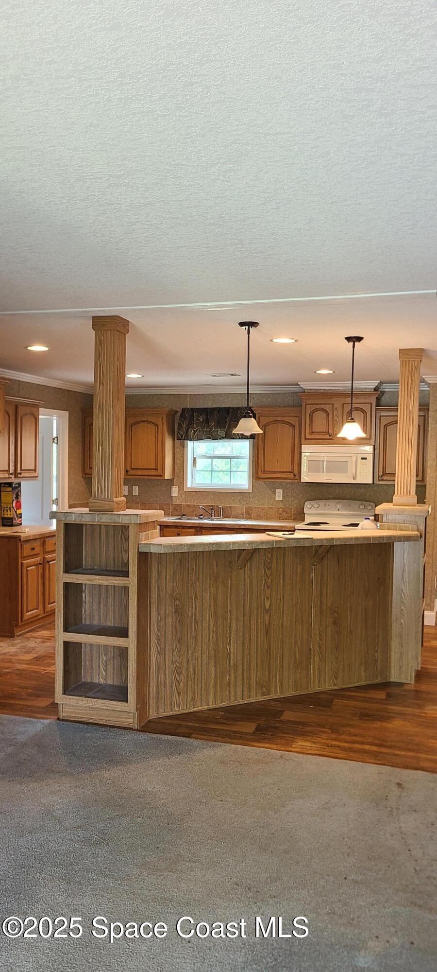 17189 County Road 252 Live Oak, FL 32060 - Photo 10 of 31 a view of a kitchen with counter top space