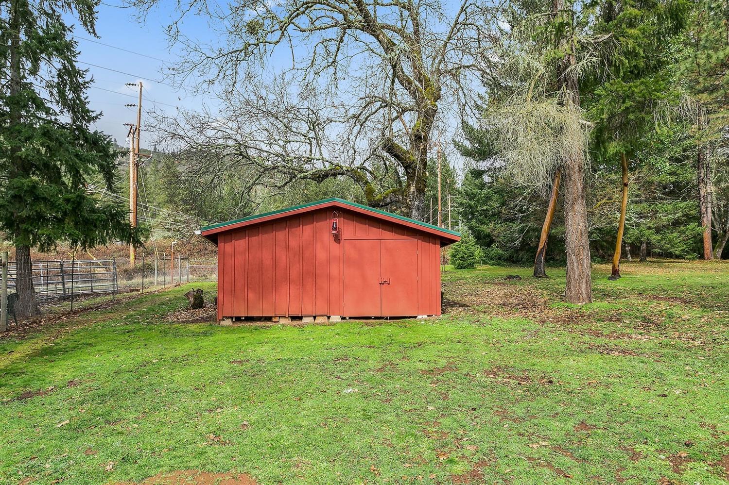 8050 North Applegate Road Grants Pass, OR 97527 - Photo 21 of 34 Next to the garden is a great shed to st