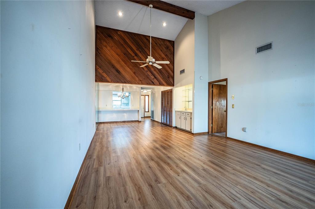 2025 Sylvester Road, Unit AA1 Lakeland, FL 33803 - Photo 18 of 65 a view of hallway with wooden floor