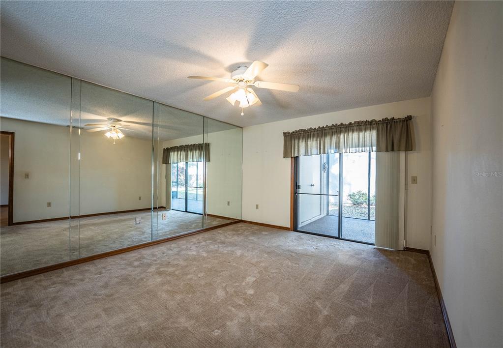2025 Sylvester Road, Unit AA1 Lakeland, FL 33803 - Photo 24 of 65 a view of an empty room with a window