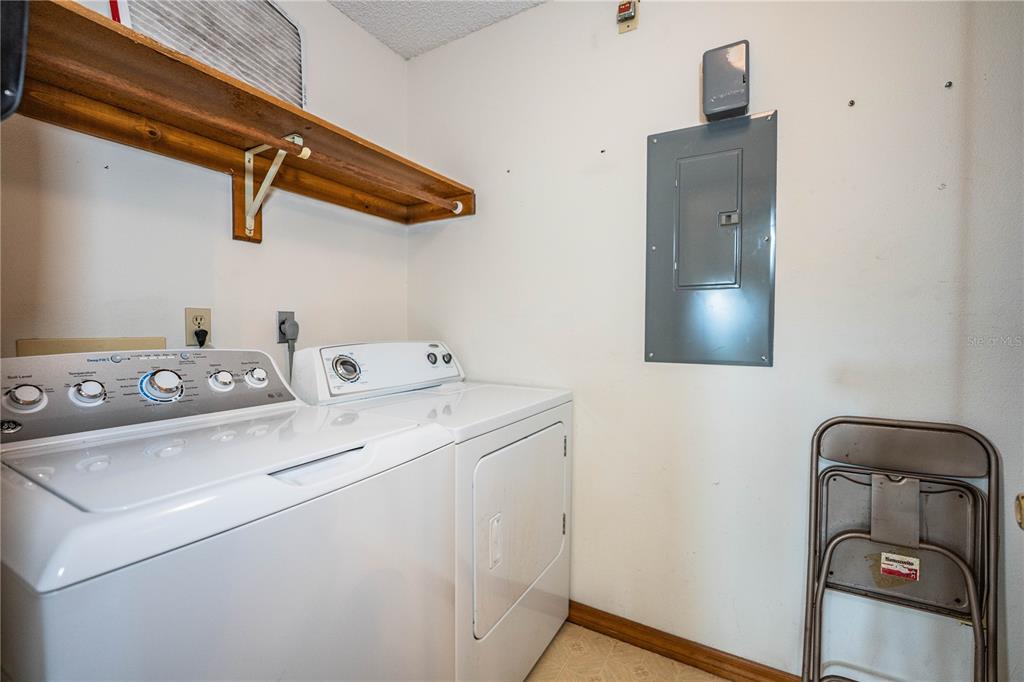2025 Sylvester Road, Unit AA1 Lakeland, FL 33803 - Photo 44 of 65 a utility room with dryer and washer