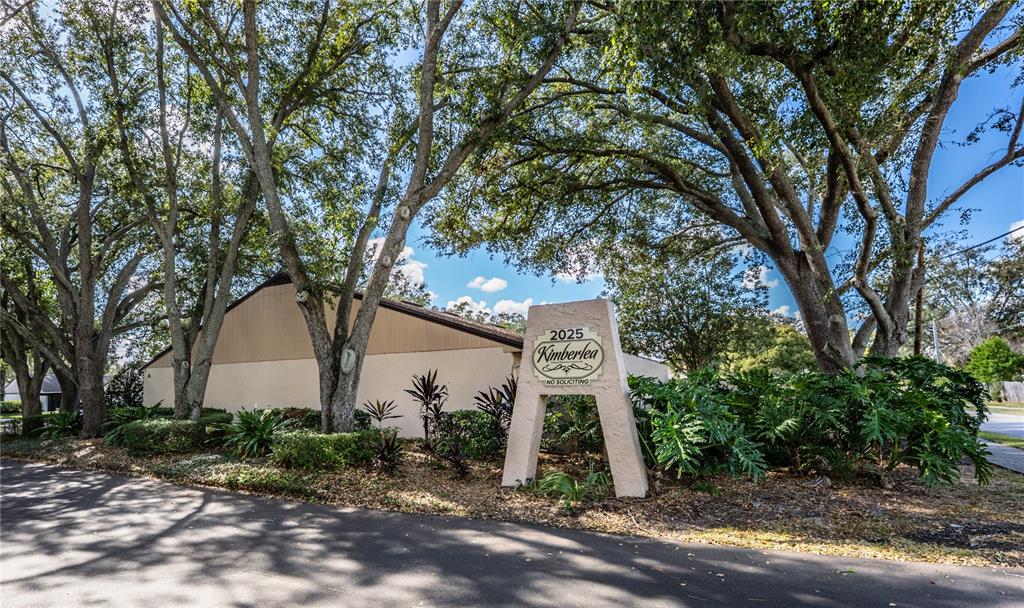 2025 Sylvester Road, Unit AA1 Lakeland, FL 33803 - Photo 61 of 65 a front view of a house with garden