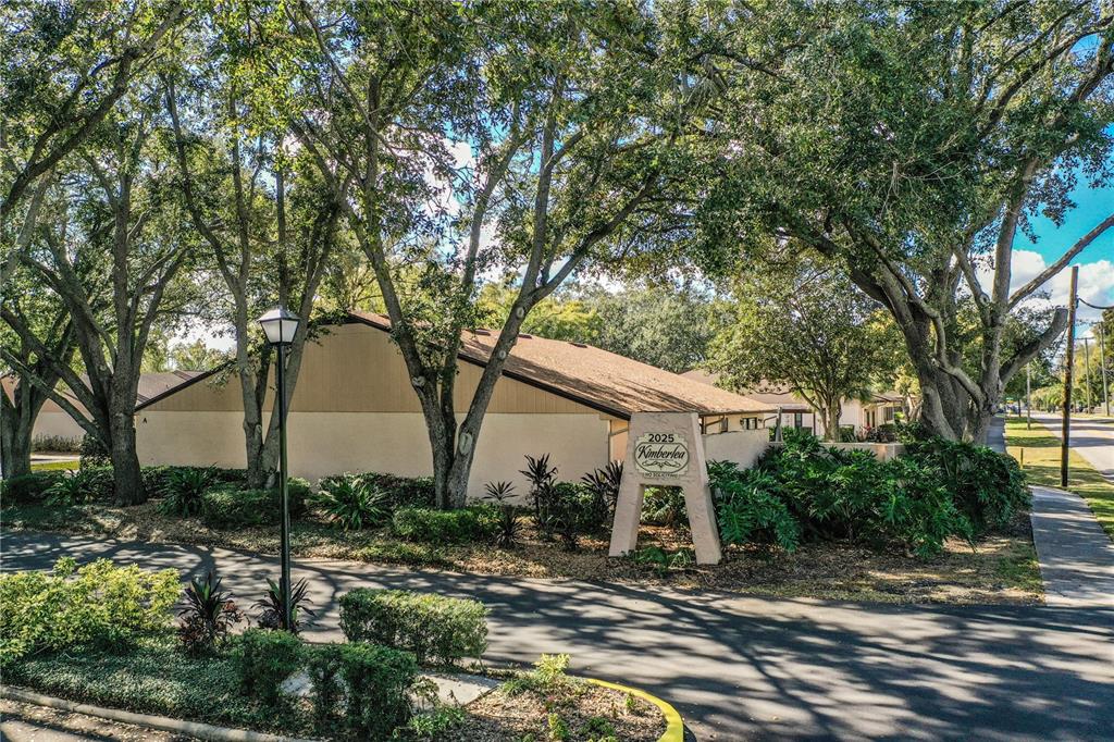 2025 Sylvester Road, Unit AA1 Lakeland, FL 33803 - Photo 62 of 65 a view of a house with a yard
