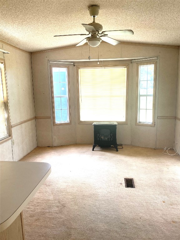 125 Kellar Road, Unit 1 Smithville, TX 78957 - Photo 12 of 18 an empty room with windows and ceiling fan