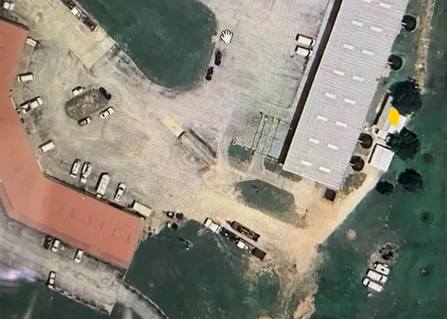 an aerial view of house with yard