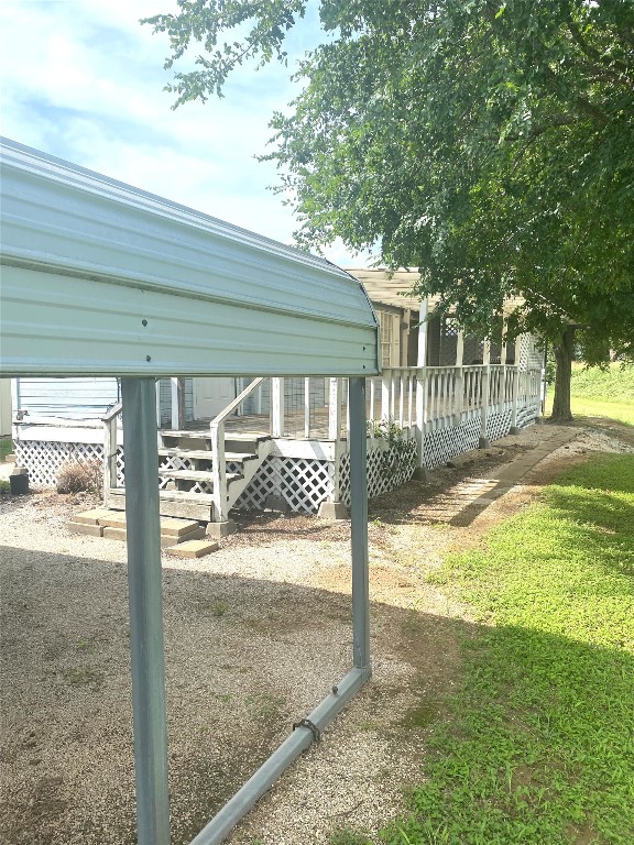125 Kellar Road, Unit 1 Smithville, TX 78957 - Photo 5 of 18 a view of a yard with wooden fence