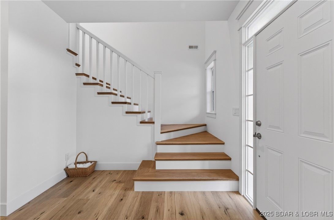 109 Allen Road Eldon, MO 65026 - Photo 36 of 58 Staircase to upper level