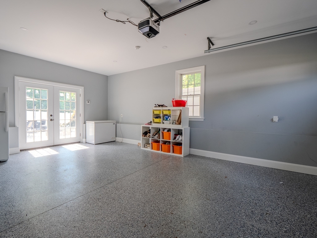 159 Mishawum Road Woburn, MA 01801 - Photo 38 of 41 a view of a livingroom with a ceiling fan and window
