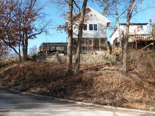 8990 Riverside Drive Brighton, MI 48116 - Photo 1 of 25 Front of House