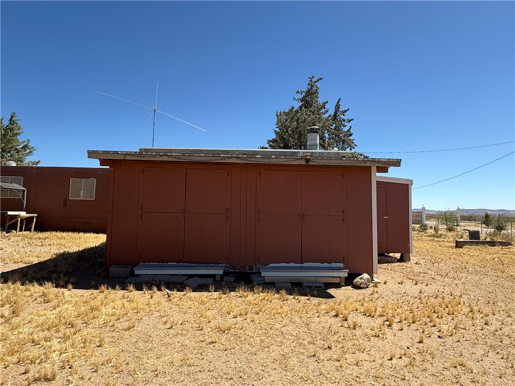 8051 7th Street Dolan Springs, AZ 86441 - Photo 46 of 65 a view of a backyard of the house