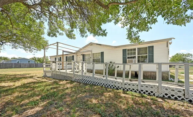 a house with trees in front of it