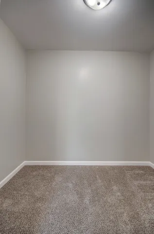 a view of a room with an empty space