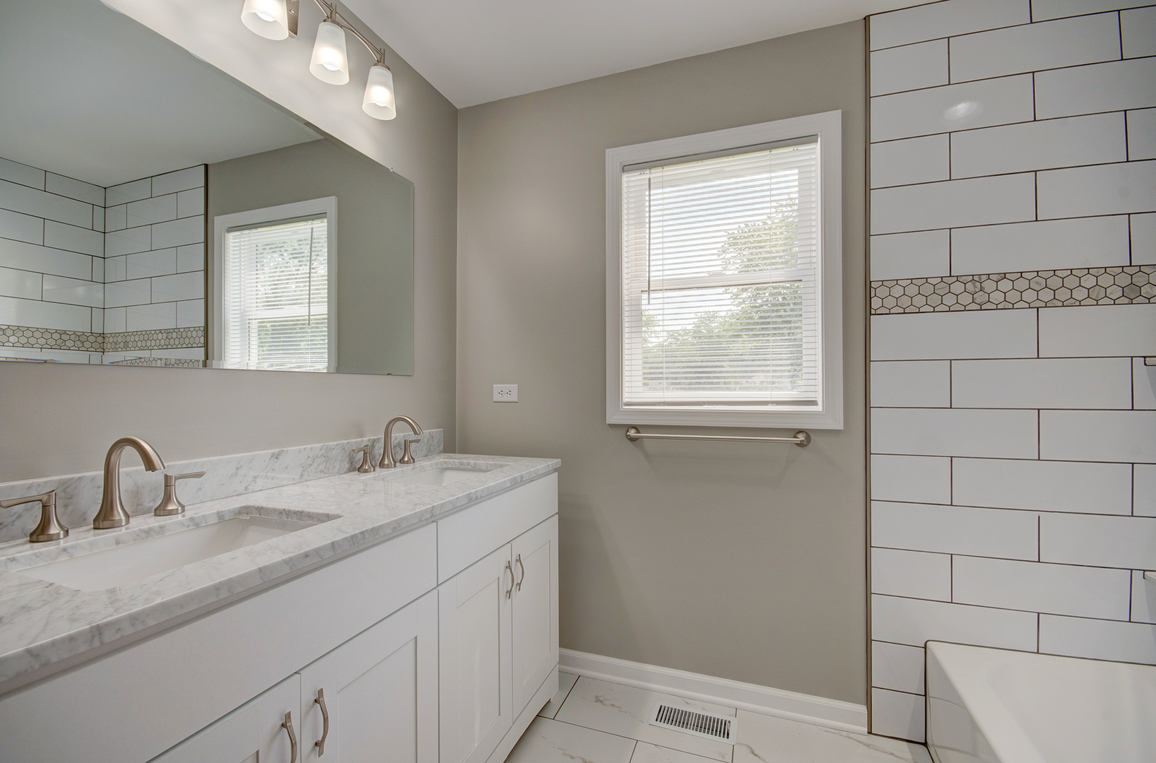 386 West 3rd Street Braidwood, IL 60408 - Photo 23 of 36 a bathroom with a sink and a mirror