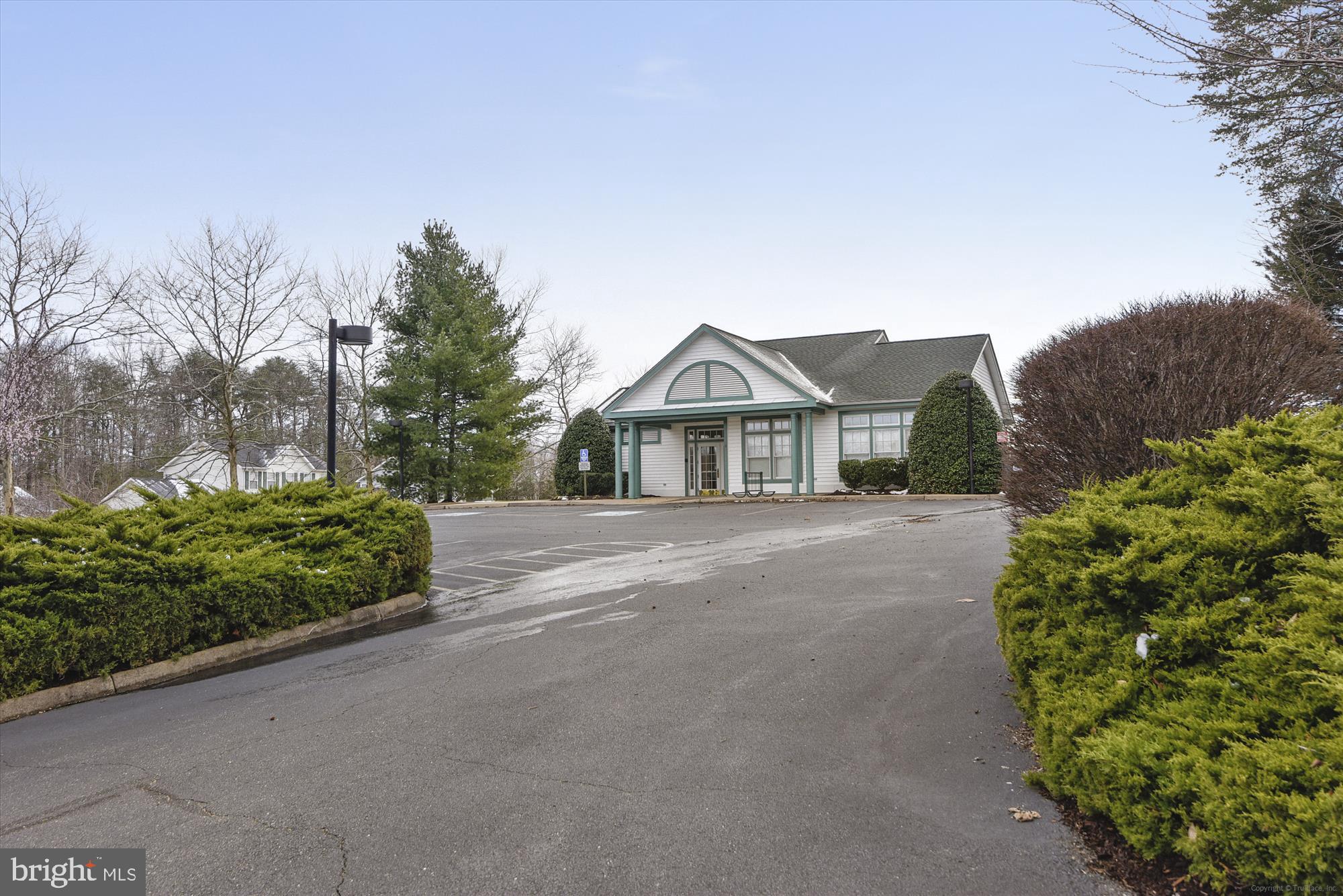 608 Torbert Loop Stafford, VA 22554 - Photo 22 of 24 a front view of a house with a yard and potted plants