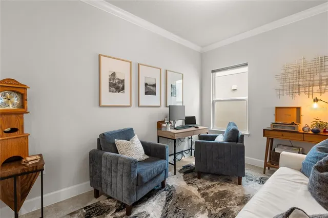 a living room with furniture and a window
