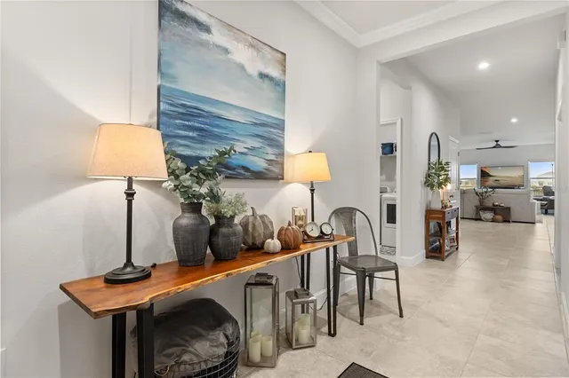 a bedroom with furniture and a lamp