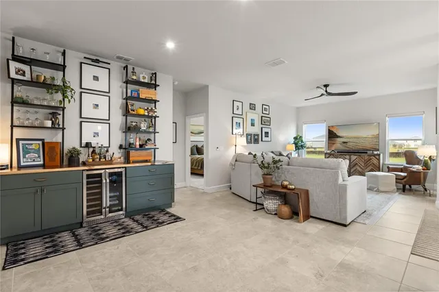 a room with furniture and a kitchen