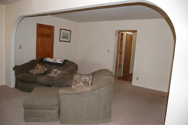 a living room with a fireplace