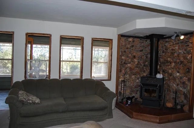 a view of front door of house with stairs