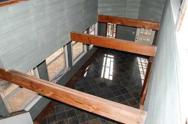a bathroom with a bathtub and window