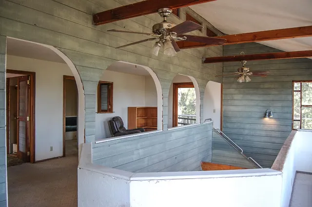 an empty room with windows