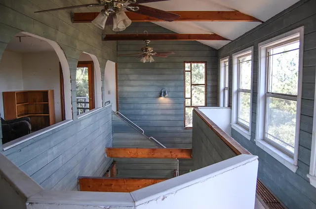 a view of a storage & utility room with a window