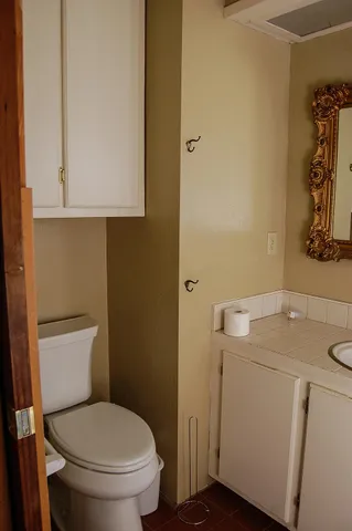 a view of a house with a small yard