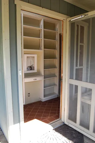 a view of storage and utility room