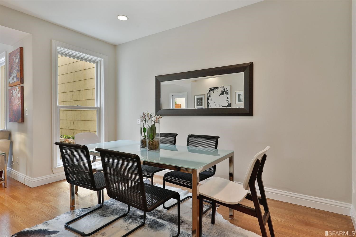 261 Henry Street, Unit A San Francisco, CA 94117 - Photo 12 of 64 a view of a dining room with furniture and wooden floor