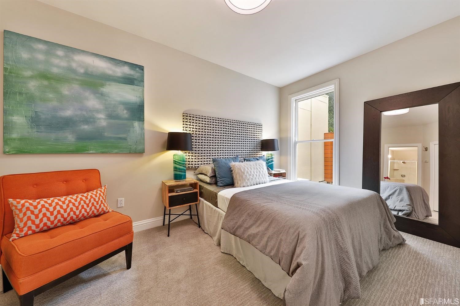 261 Henry Street, Unit A San Francisco, CA 94117 - Photo 20 of 64 a bedroom with a bed couch and window