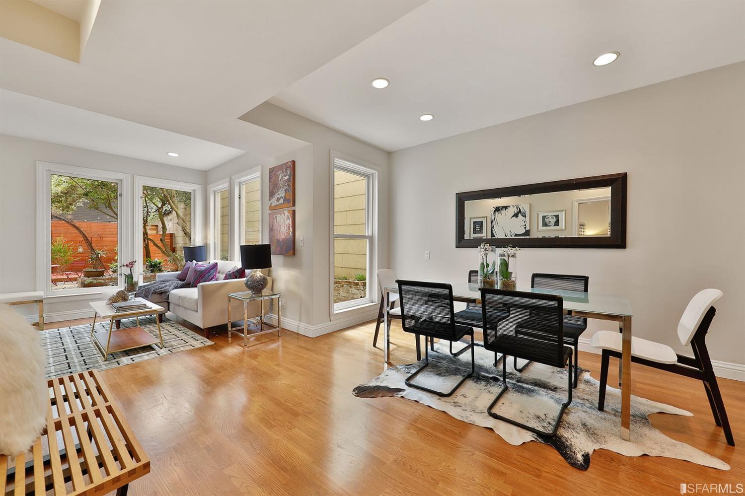 261 Henry Street, Unit A San Francisco, CA 94117 - Photo 41 of 64 a living room with furniture and a wooden floor