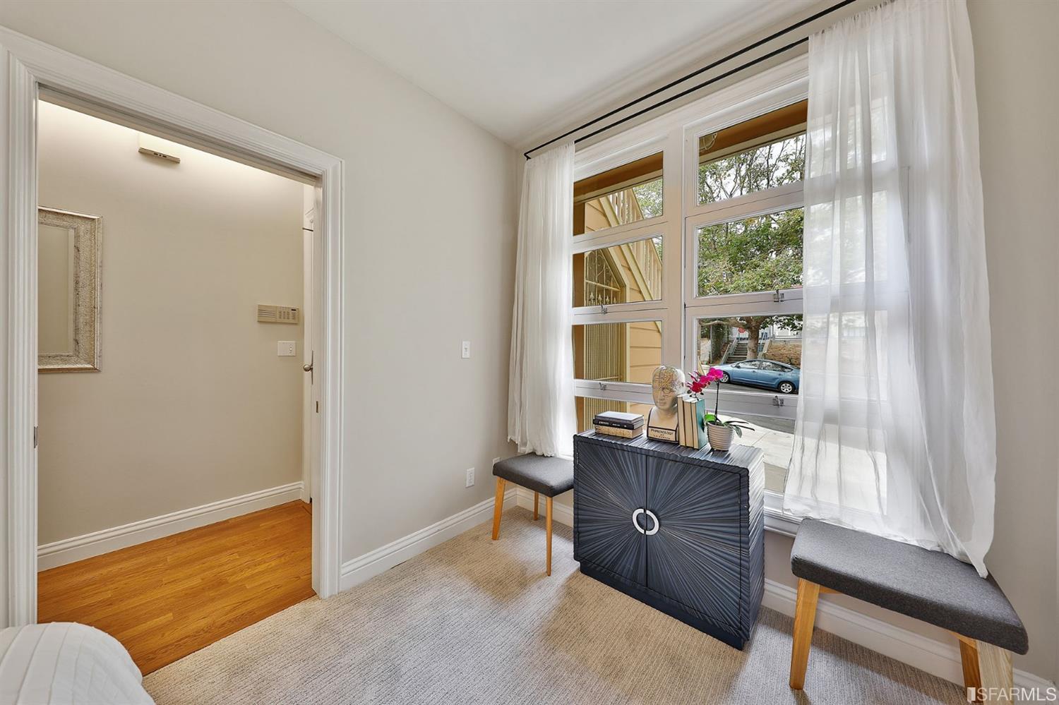 261 Henry Street, Unit A San Francisco, CA 94117 - Photo 56 of 64 a view of a workspace with furniture and a window