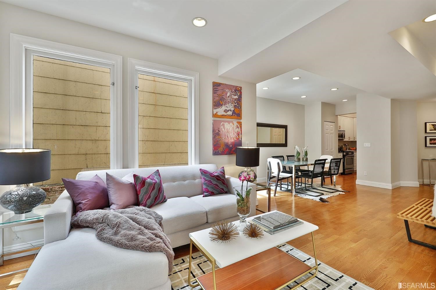261 Henry Street, Unit A San Francisco, CA 94117 - Photo 7 of 64 a living room with furniture wooden floor and a table