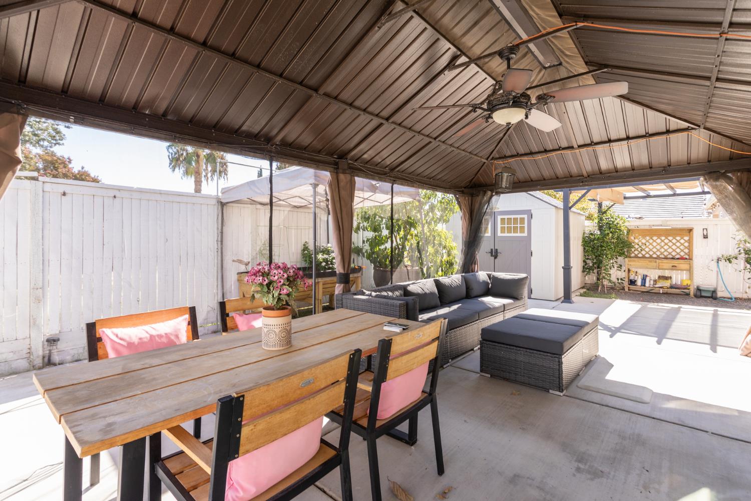 2227 North Highland Avenue Clovis, CA 93619 - Photo 38 of 48 a view of a patio with a table and chairs