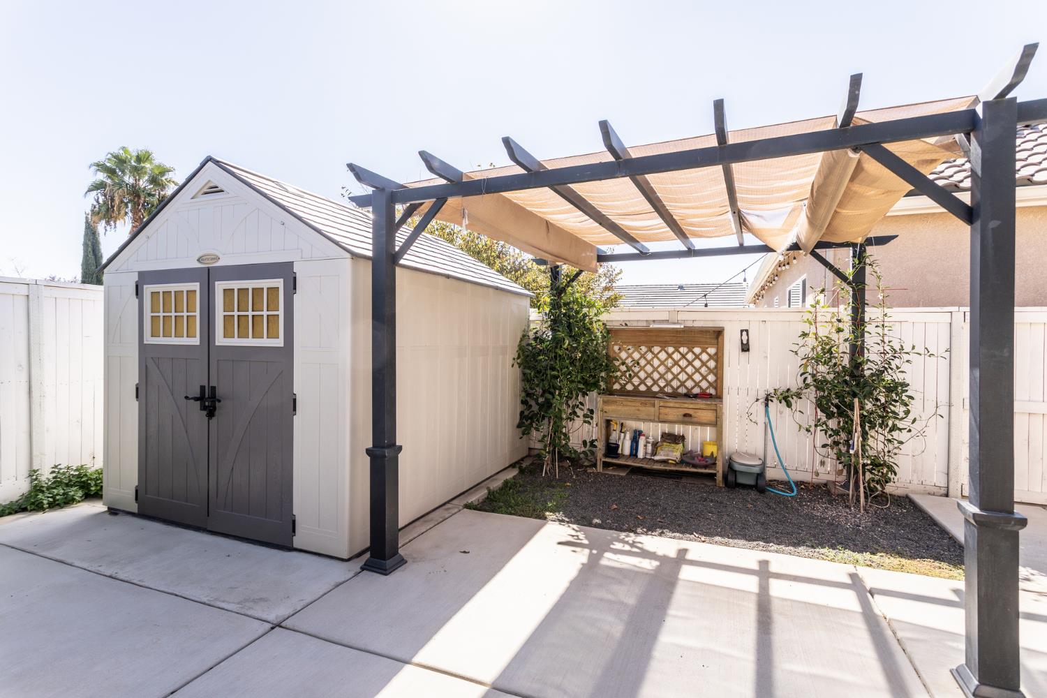 2227 North Highland Avenue Clovis, CA 93619 - Photo 42 of 48 a house view with a wooden deck