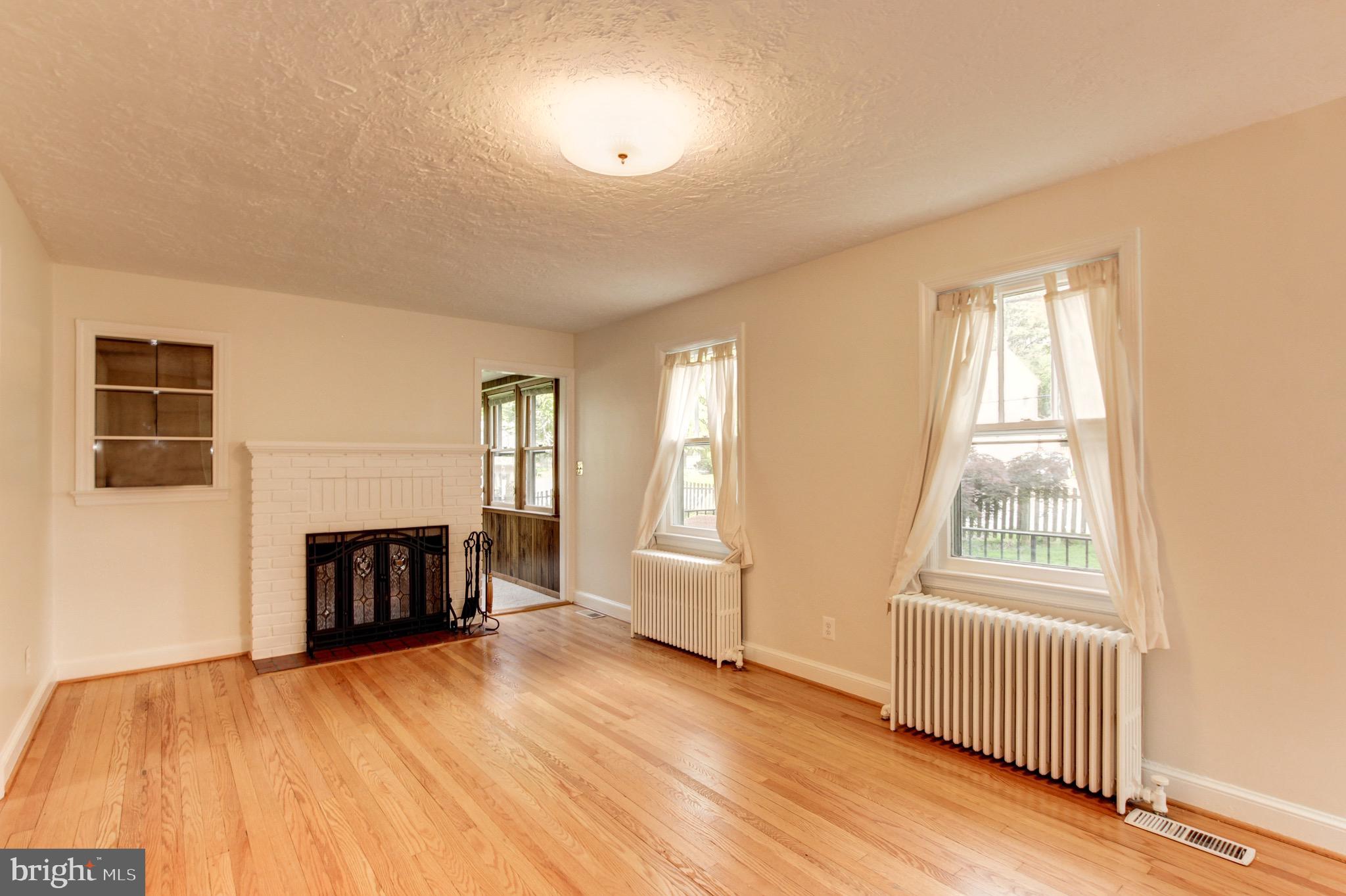 408 Baltimore Road Rockville, MD 20850 - Photo 9 of 55 Living Room and Entry Way