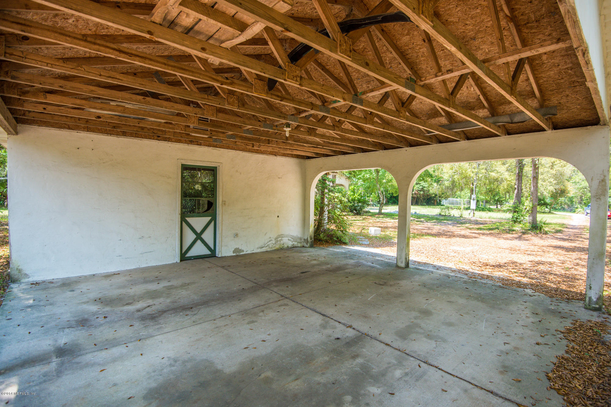 865 Kings Estate Road St. Augustine, FL 32086 - Photo 19 of 24 a view of a room with wooden walls