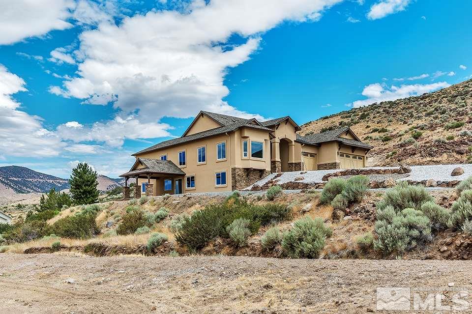 300 Andrew Lane Reno, NV 89521 - Photo 1 of 25 front view of a house with a yard