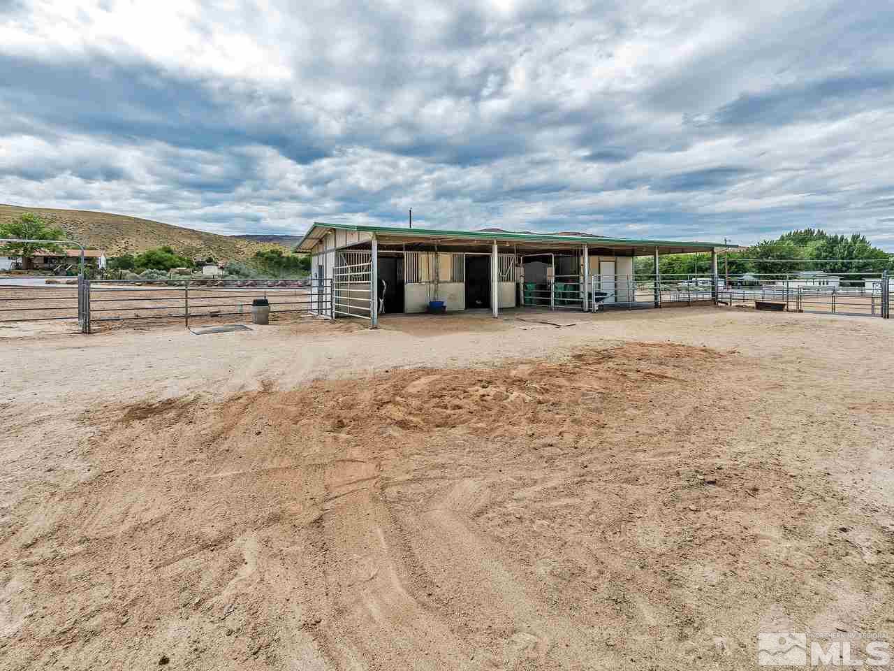300 Andrew Lane Reno, NV 89521 - Photo 21 of 25 a view of a house with a yard