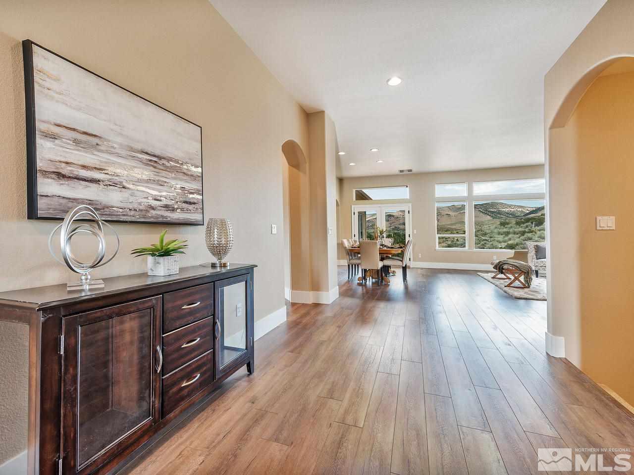 300 Andrew Lane Reno, NV 89521 - Photo 3 of 25 a living room with furniture and a wooden floor
