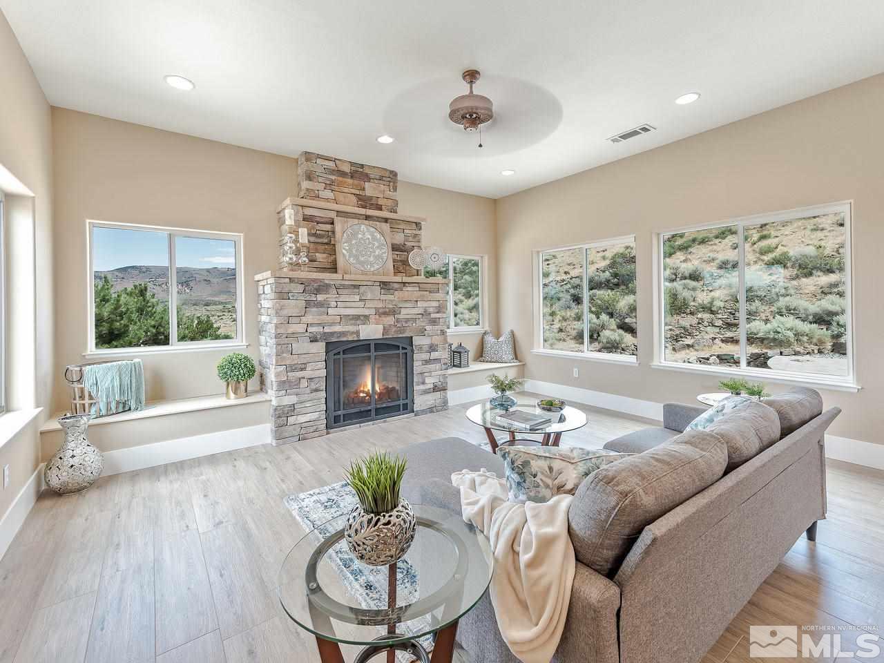 300 Andrew Lane Reno, NV 89521 - Photo 8 of 25 a living room with furniture and a fireplace