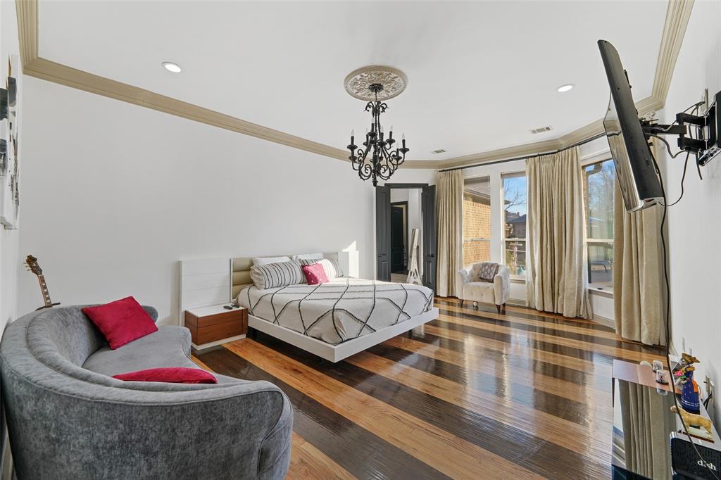 3310 Collard Road Arlington, TX 76017 - Photo 15 of 40 a bedroom with furniture and a chandelier