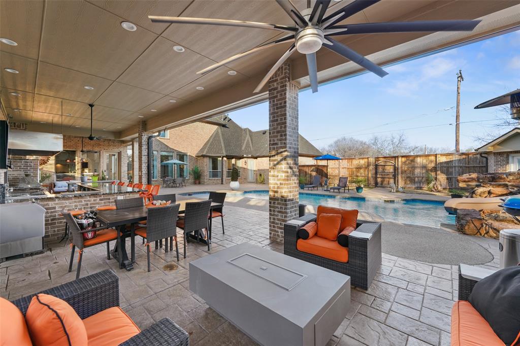 3310 Collard Road Arlington, TX 76017 - Photo 33 of 40 a living room with lots of furniture and a table