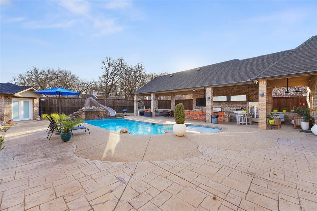 3310 Collard Road Arlington, TX 76017 - Photo 34 of 40 a view of a house with backyard porch and sitting area